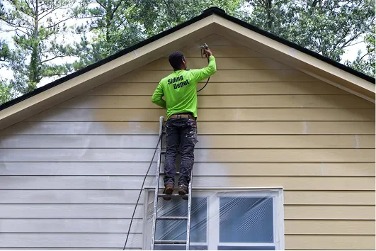 Professional exterior painting on a North Atlanta home by Siding Depot